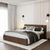 A bedroom with a bed, curtains, and wall decorations. Produktbild-Vorschau