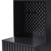 A close-up view of a black cabinet with a pegboard back and a drawer front with vertical slats. Voir les images du produit