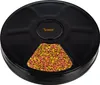 A black automatic pet feeder filled with colorful pet food, shown from a top-down perspective against a white background. Produktbild-Vorschau