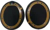 Two black ear pads with brown trim are shown against a white background. Produktbild-Vorschau
