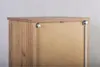 Close-up view of the top and side of a wooden cabinet, showing the construction and mounting hardware. Podgląd zdjęcia produktu