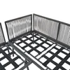 Close-up view of the base structure of an L-shaped outdoor lounge set, showing the metal frame and woven straps that support the cushions. The rope-like detailing on the backrests is also visible. Anteprima dell’immagine prodotto