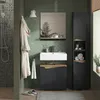 A modern bathroom with a green herringbone tile wall, featuring a wall-mounted sink, a tall storage cabinet, a bathrobe hanging on a hook, and a shower. Náhled obrázku produktu