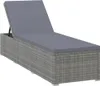 A single gray poly rattan sun lounger with a gray cushion, shown from a side-diagonal angle on a white background. Náhľad obrázku produktu