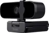 A black Trust webcam is shown from a slightly elevated front-facing angle against a white background. Náhľad obrázku produktu