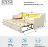 A diagram showing the dimensions and features of a sofa bed, with additional icons indicating capacity, included tools, and assembly time. Voir les images du produit