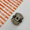 A STIHL clutch part is shown next to its packaging. Produktbild-Vorschau