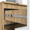 A close-up view of a drawer slide mechanism on a wooden dresser. Produktbild-Vorschau