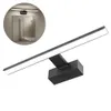 A black LED bathroom light fixture with a linear design, shown against a white background. A circular inset shows the light mounted above a mirror in a bathroom setting. Produktbild-Vorschau
