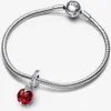 A silver Pandora bracelet with a red ladybug charm. Podgląd zdjęcia produktu
