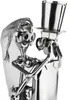 A close-up studio shot of a metal sculpture of a bride and groom. Anteprima dell’immagine prodotto