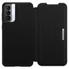 A black leather folio case for a Samsung Galaxy S21+ 5G phone is shown open, displaying the inside of the case and the phone's camera array. Náhľad obrázku produktu