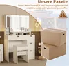 A vanity table with a lighted mirror and stool, with shipping boxes and a ship in the background. Produktbild-Vorschau