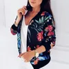 A woman wearing a floral bomber jacket. Anteprima dell’immagine prodotto