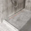 A modern concrete shower floor with a linear drain. Anteprima dell’immagine prodotto
