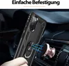 A person's hand is holding a black phone case with a ring holder, which is magnetically attached to a rose gold car mount. The car mount is attached to a car's air vent. Produktbild-Vorschau