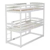 A white wooden triple bunk bed frame with slatted bases, shown from a side-angle perspective against a white background. Náhled obrázku produktu