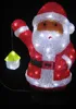 A decorative LED Santa Claus figure holding a lantern against a black background. Náhľad obrázku produktu