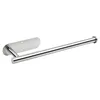 A silver-colored stainless steel paper towel holder mounted on a wall. Produktbild-Vorschau