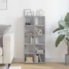 Two gray CD shelves are placed next to each other in a room with a couch and a plant. Produktbild-Vorschau