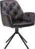 A single gray velvet armchair with a black metal base. Produktbild-Vorschau