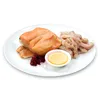 A white plate with a serving of food, including a piece of cooked salmon, raw chicken strips, a small dish of sauce, and a dollop of red berries. Produktbild-Vorschau