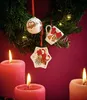 Christmas wreath with ornaments and lit candles. Produktbild-Vorschau