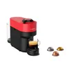 A red and black Nespresso coffee machine with a cup of coffee and three coffee capsules. Anteprima dell’immagine prodotto