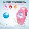 A pink children's watch is shown with water splashing around it, indicating its waterproof feature. Text overlays describe its waterproof capabilities and limitations. Produktbild-Vorschau