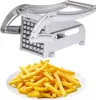 A potato cutter and a plate of french fries. Náhled obrázku produktu