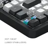 A close-up view of a mechanical keyboard, highlighting its hot-swappable switches and lubed stabilizers. Produktbild-Vorschau