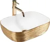 A gold and white washbasin with a gold faucet. Náhľad obrázku produktu