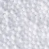 A close-up, top-down view of many small white EPS beads. Anteprima dell’immagine prodotto
