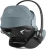 A studio shot of a baby car seat. Produktbild-Vorschau