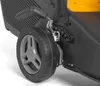 Close-up of a lawnmower wheel and part of the chassis. Produktbild-Vorschau