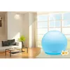 A blue orb-shaped aroma diffuser is shown in a modern living room setting with a sofa and coffee table. Podgląd zdjęcia produktu