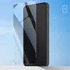A clear screen protector is shown diagonally over a black smartphone against a bright blue sky background. Náhľad obrázku produktu