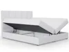 A white boxspring bed with the storage compartment open, revealing the mattress and internal storage space. Produktbild-Vorschau