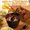 A close-up shot of disposable black plastic spoons in a meal prep and to-go food setting. Produktbild-Vorschau