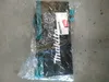A product in its original packaging, lying on a concrete floor. Produktbild-Vorschau