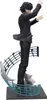 A figurine of a person in a suit, conducting music. Produktbild-Vorschau