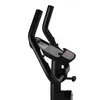 A close-up view of the handlebars and digital display of an exercise bike. Produktbild-Vorschau