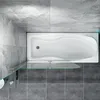A top-down view of a bathtub with a glass shower screen in a tiled bathroom. Produktbild-Vorschau