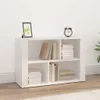 A white sideboard with books and a framed picture on top, set against a white wall and wooden floor. Náhľad obrázku produktu