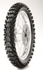 A close-up studio shot of a motorcycle tire mounted on a wheel rim, against a white background. Produktbild-Vorschau