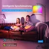 Two girls and a dog on a couch, with a colorful floor lamp. Voir les images du produit