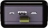 Close-up view of the ports and a metallic accent on a black electronic device. Náhled obrázku produktu