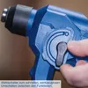 A hand is shown adjusting a switch on a blue power tool. Produktbild-Vorschau