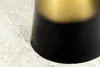 A close-up view of the base of a black and gold gradient table on a textured white surface. Produktbild-Vorschau