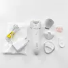 A collection of Philips epilator accessories and the main epilator unit are laid out on a white background. Náhled obrázku produktu